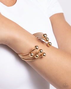 Assembly Line - Gold Cuff Bracelet